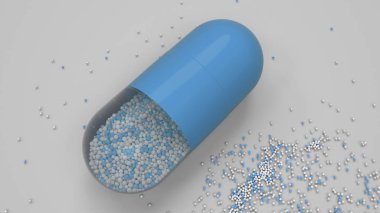 Beyaz arka plan üzerinde renkli ilaç kapsül