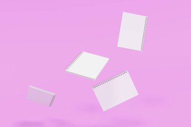 Menekşe arka plan üzerinde dört defter spiral ile bağlı