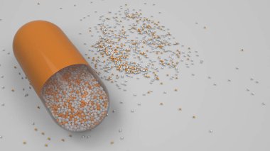 Beyaz arka plan üzerinde renkli ilaç kapsül