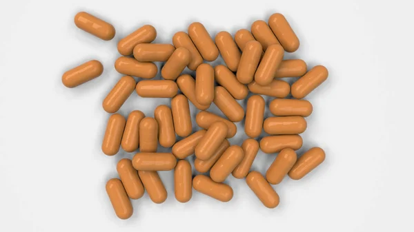 Stapel van Oranje geneeskunde capsules — Stockfoto