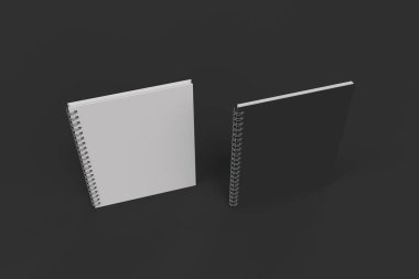 Siyah arka plan üzerine iki defter spiral ile bağlı
