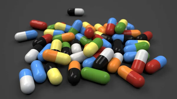 Haufen bunter Medikamentenkapseln — Stockfoto
