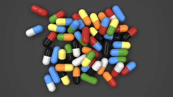 Pilha de cápsulas de medicamentos coloridos — Fotografia de Stock