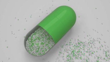 Beyaz arka plan üzerinde renkli ilaç kapsül