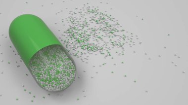 Beyaz arka plan üzerinde renkli ilaç kapsül