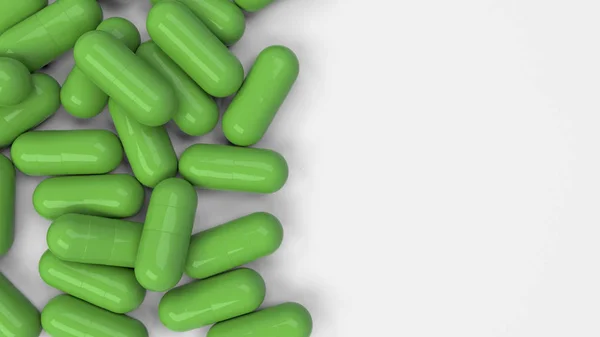 Pilha de cápsulas de medicina verde — Fotografia de Stock