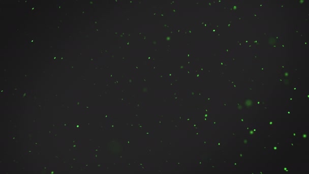 緑の浮遊粒子のボケ味の抽象的な背景は 空気中のほこり スローモーション — ストック動画