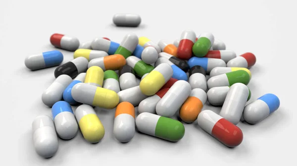 Pilha de cápsulas de medicamentos coloridos — Fotografia de Stock