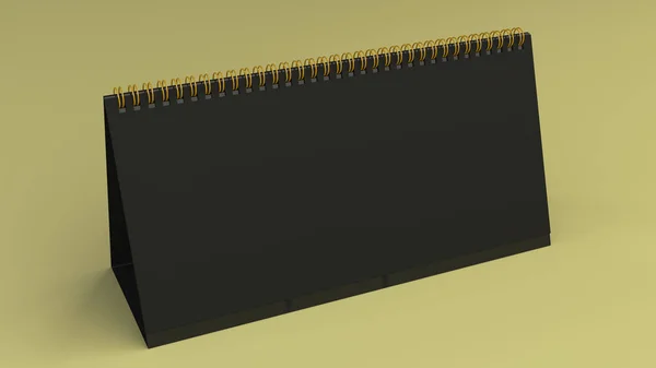 Schwarzer Tischkalender-Attrappe auf gelber Oberfläche — Stockfoto