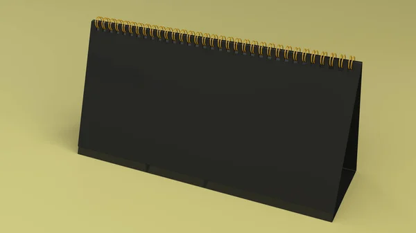 Fekete asztali naptár modell a sárga felület — Stock Fotó