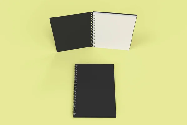 Dos cuadernos con espiral encuadernada sobre fondo amarillo — Foto de Stock