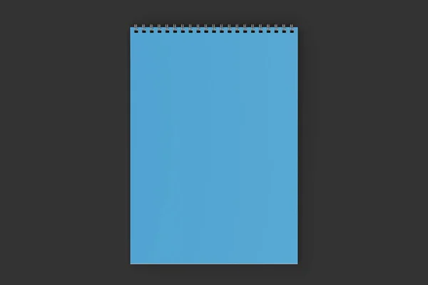 黑色背景金属螺旋装订的空白蓝色笔记本电脑 — 图库照片