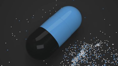 Siyah arka plan üzerinde renkli ilaç kapsül