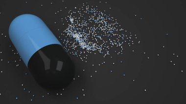 Siyah arka plan üzerinde renkli ilaç kapsül