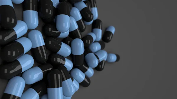 Halom fekete és kék gyógyszer kapszula — Stock Fotó