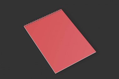 Boş kırmızı defter ile metal sarmal siyah arka plan üzerine bağlı