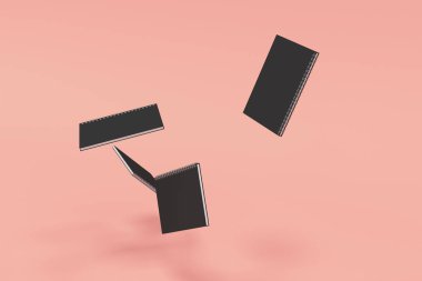 Kırmızı zemin üzerine dört defter spiral ile bağlı