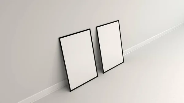 Blank white poster in black frame standing on the floor — Stock Photo, Image