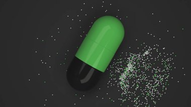 Siyah arka plan üzerinde renkli ilaç kapsül