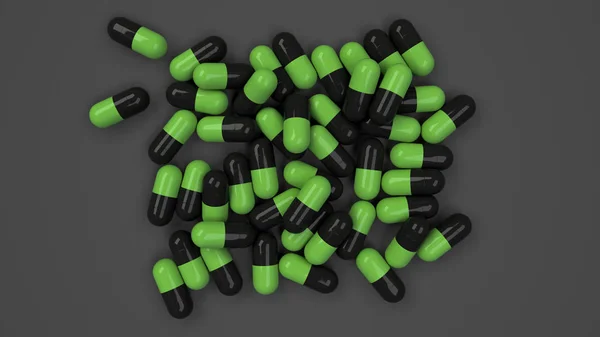 Högen av svarta och gröna medicin kapslar — Stockfoto