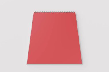 Beyaz arka plan üzerinde boş kırmızı defter metal spiral ile bağlı