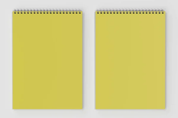 白色背景金属螺旋装订的空白黄色笔记本 — 图库照片