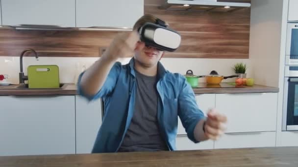 Young man playing racing games using vr headset — Stock Video