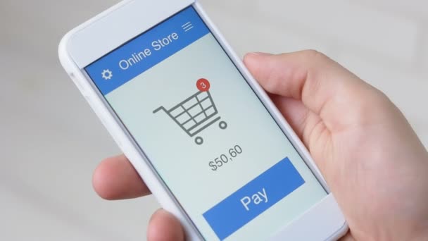 Pagamento de compras on-line usando aplicativo de smartphone — Vídeo de Stock