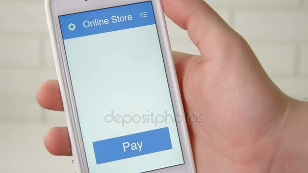 Smartphone uygulama kullanarak satış süre içinde online alışveriş için ödeme — Stok video