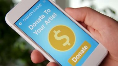 Sadaka uygulama smartphone kullanarak onun favorive sanatçı için bir online bağış yapmayı adam