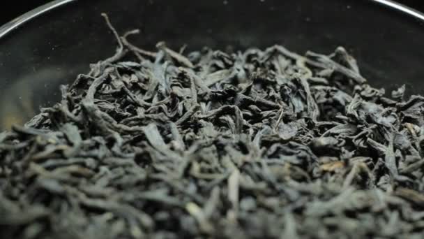 Bladeren van thee, macro voor goodtime drankje — Stockvideo