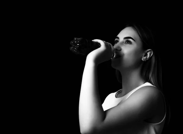 Young pretty woman drinks water Grayscale — Stock Photo, Image