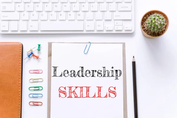Text Leadership skills on white paper background / business concept.