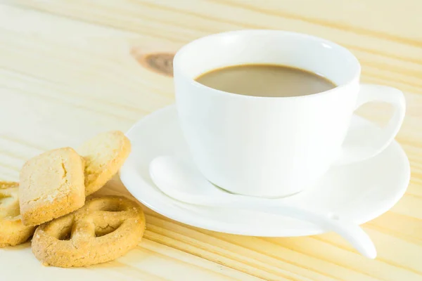 Kaffeetasse Und Bonbons Auf Holztischhintergrund — Stockfoto