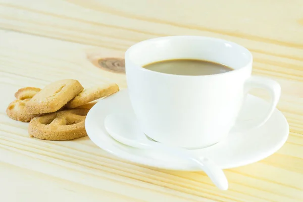 Kaffeetasse Und Bonbons Auf Holztischhintergrund — Stockfoto
