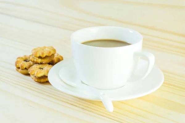 Kaffeetasse Und Bonbons Auf Holztischhintergrund — Stockfoto