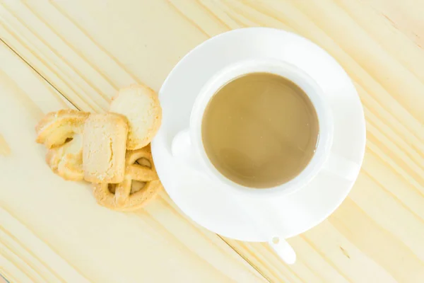 Kaffeetasse Und Bonbons Auf Holztischhintergrund — Stockfoto