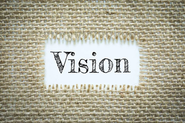 Text Vision on paper white has Cotton yarn background you can apply to your product.