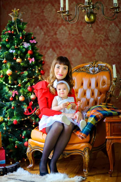 Happy Mother Sit Chair Festive Tree Hugs Her Little Daughter Stock Picture