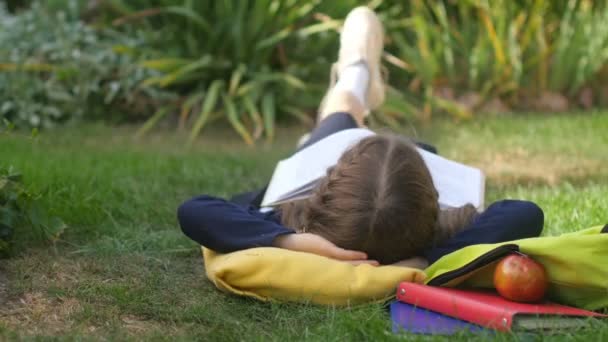 Girl Schoolgirl Lying Resting Lawn Open Book Children Homework School — 비디오