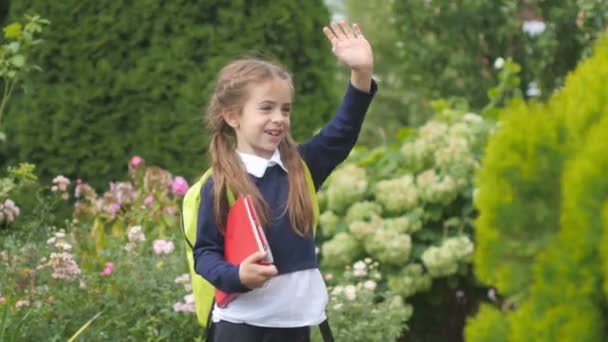 Schoolgirl Backpack Books Hand Pack Waves Parents Smiles — Stock Video