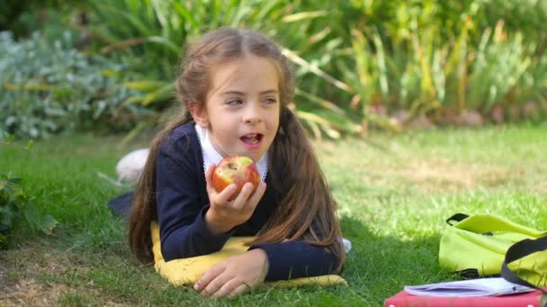 Schoolgirl Lying Grass Apple Reading Book Studying Alone Park School — Stock Video