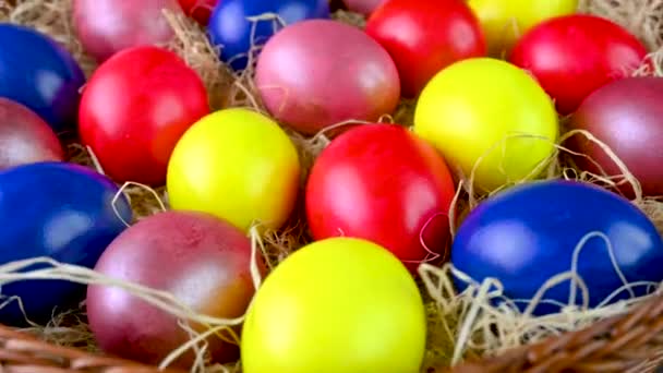 Closeup Top View Colorful Easter Eggs Lie Bacon Basket 360 — Stock video