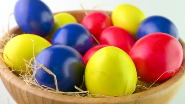Closeup Top View Colorful Easter Eggs Lie Bacon Basket 360 — Stock video