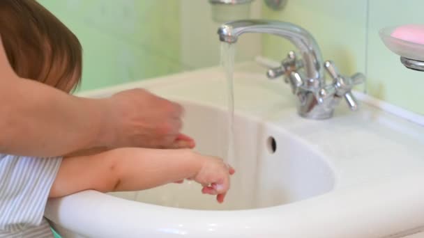 Mom Washes Her Baby Hands Bathroom Parent Teaching Her Son — Stock Video