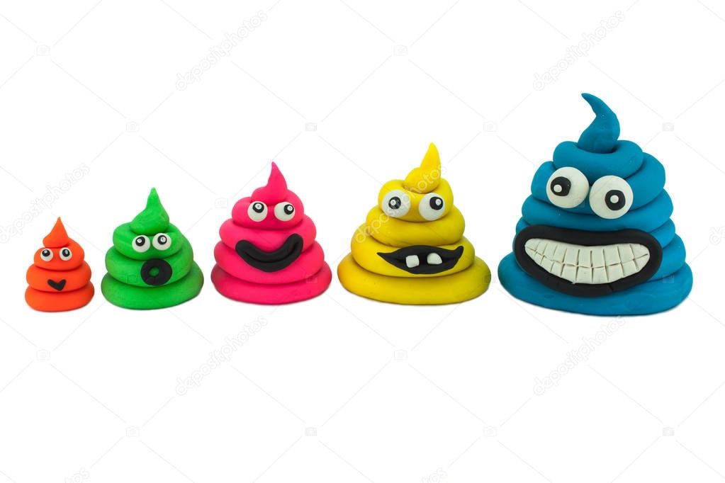 Plasticine funny poops on a white background 