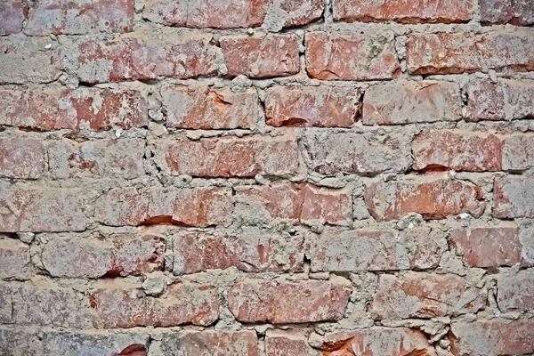 Kaba kırmızı tuğla duvar — Stok fotoğraf