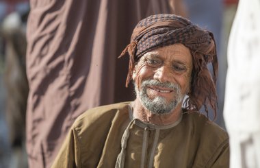 Omani man in Nizwa goat market clipart