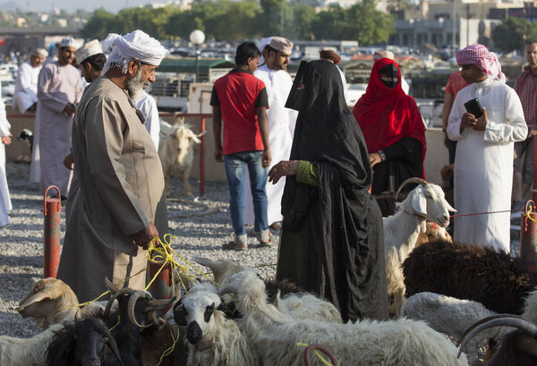 People at Nizwa goat