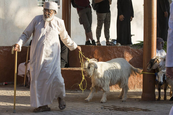 People at Nizwa goat